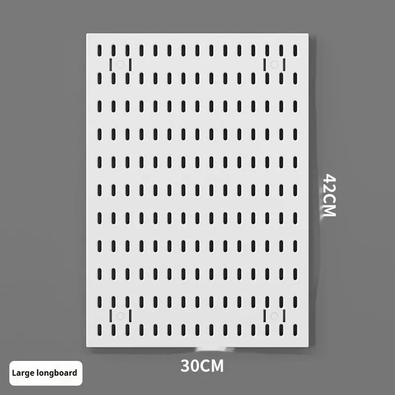 White plastic punch-free wire-wrap board organising cables on wall with modular panel design