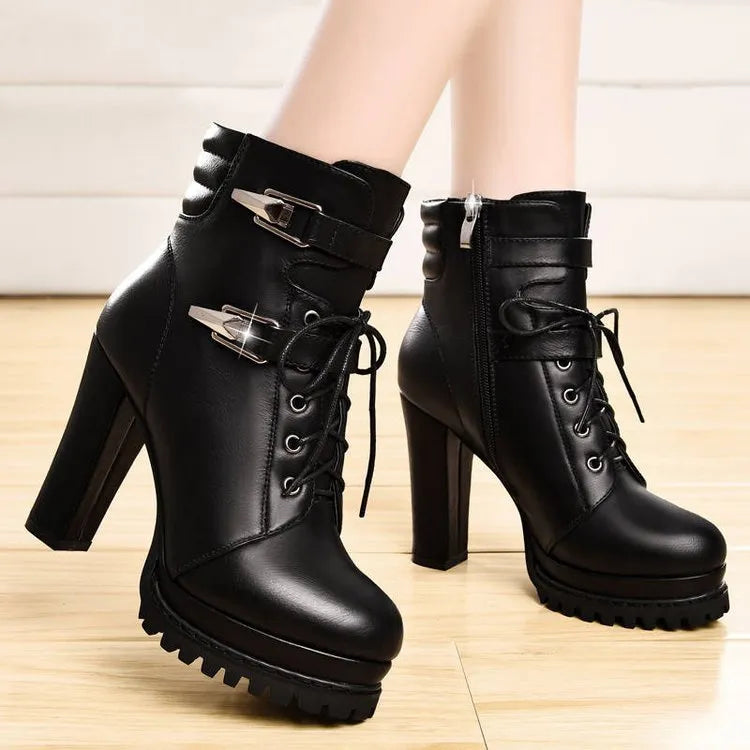 Black round toe thick heel women's high heel shoes with rubber sole on a white background