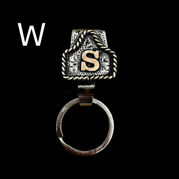 Handmade metal cow tag belt keychain in a selected colour from the A-Z letter range.