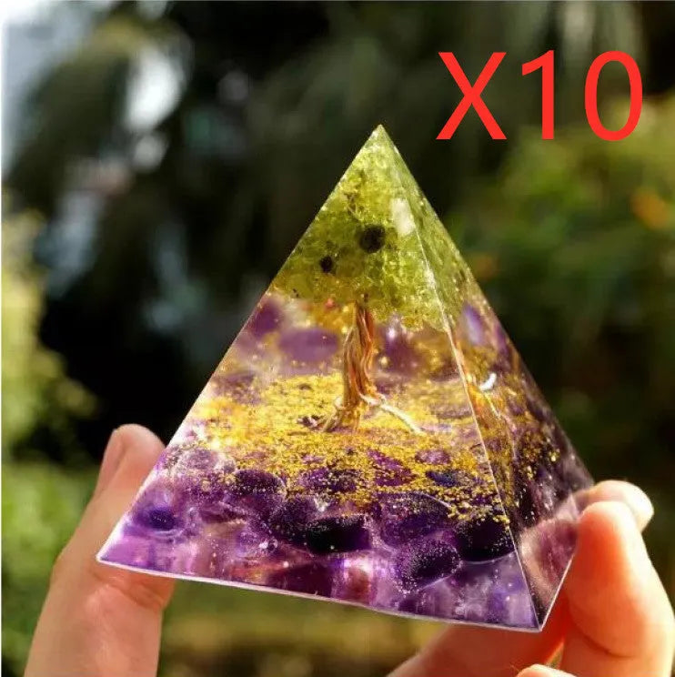 Clear epoxy resin pyramid ornament with embedded blue lapis lazuli crystal gravel, 6cm tall.