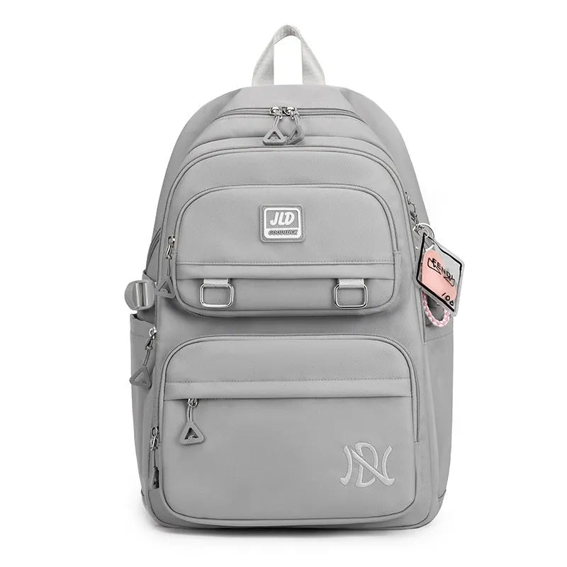 Large capacity girls' school backpack in nylon with physiological curve backplate and multiple colour options