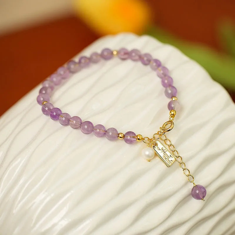 Women's natural amethyst crystal bracelet with zodiac animal design in lavender colour options