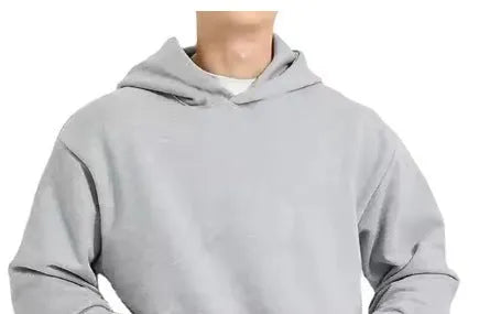 Man wearing a solid colour fleece-lined cotton hoodie sweater with a wool lining.