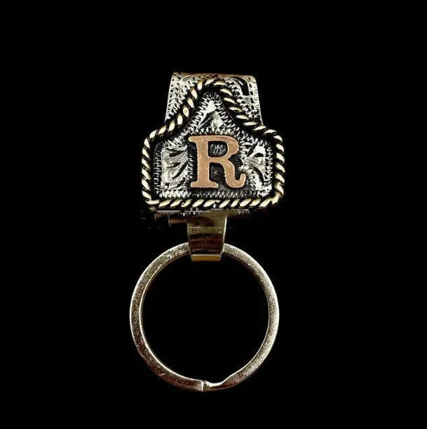 Handmade metal cow tag belt keychain in a selected colour from the A-Z letter range.