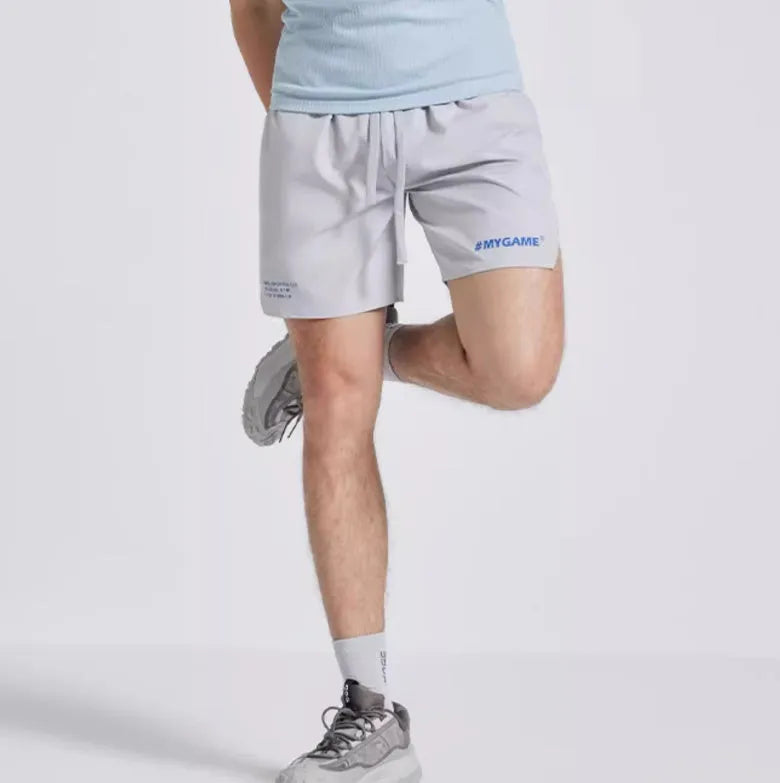 Men's training shorts in four colours with moisture-wicking fabric for sports and fitness