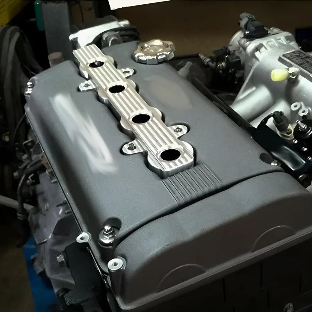 Aluminium alloy engine harness mounting bracket in blue, red, or silver finish, shown with and without holes.