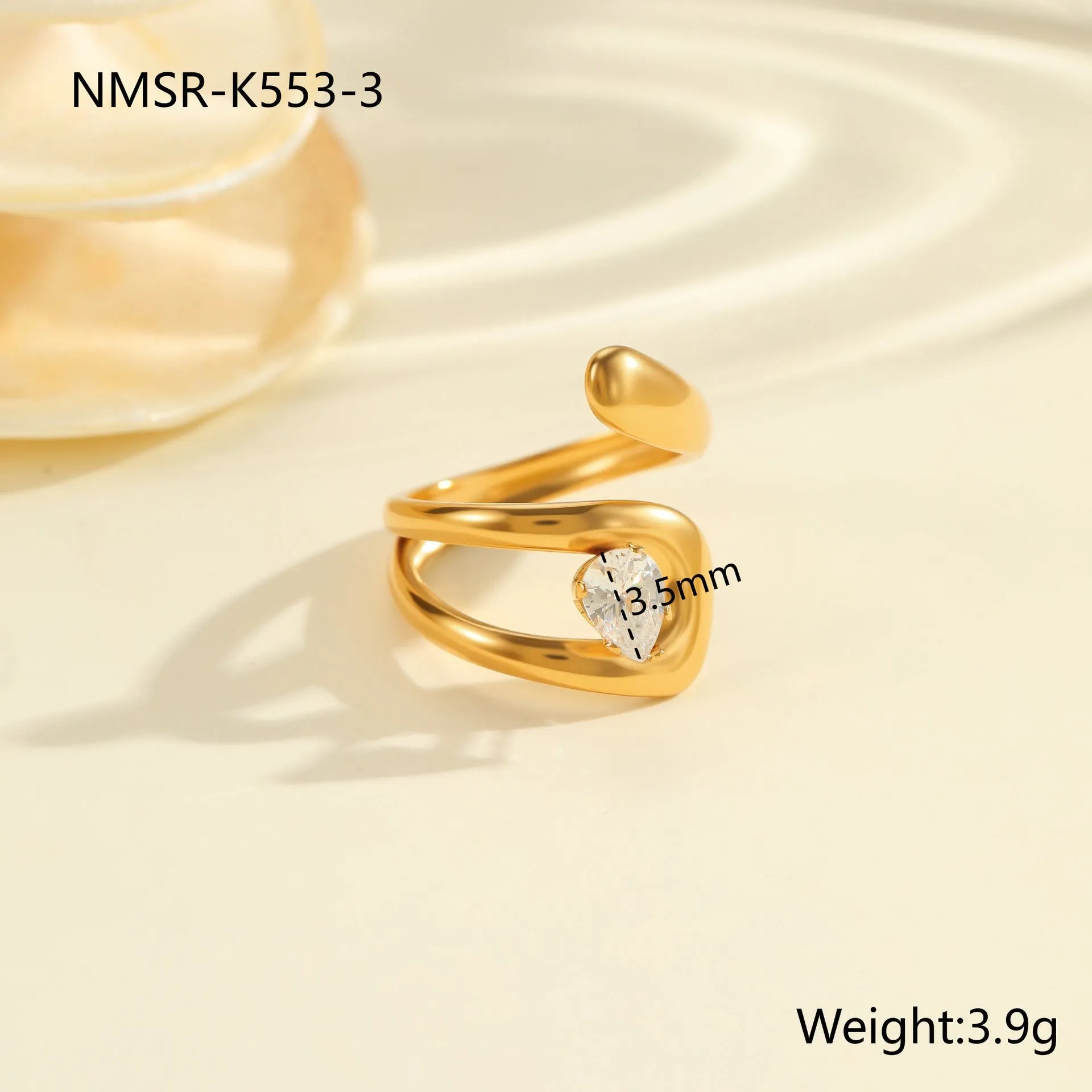 Adjustable geometric stainless steel ring showing open mouth design and colour variations