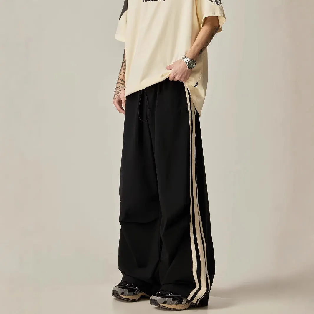 Men's black wide leg climbing trousers with high waist and straight leg design for summer leisure wear