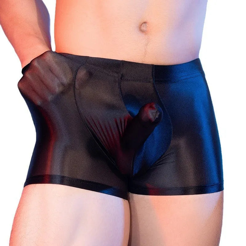 Men's red boxer shorts with an elephant nose print, made from seamless nylon fabric.