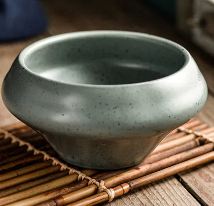 Ceramic Japanese soup bowl with stone conch shape and traditional Edo pattern design
