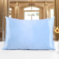 Double-sided silk pillowcase in apricot colour showing smooth satin weave texture.