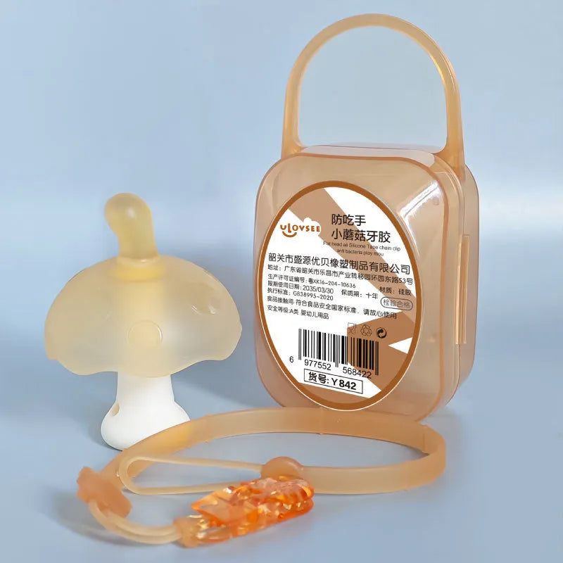 Small latex mushroom gum silicone toy in a transparent box with a chain.