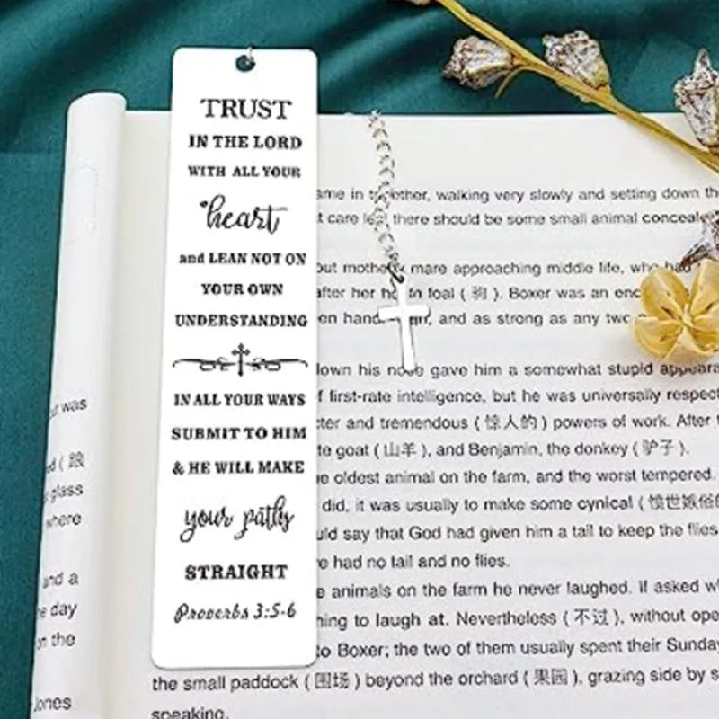 Stainless steel European style bookmark in CF-S5170 steel colour on an open book.