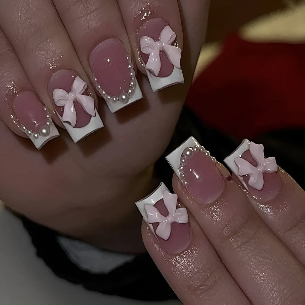 Short French manicure nail art set with tulip patterns and bow designs