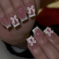 Short French manicure nail art set with tulip patterns and bow designs