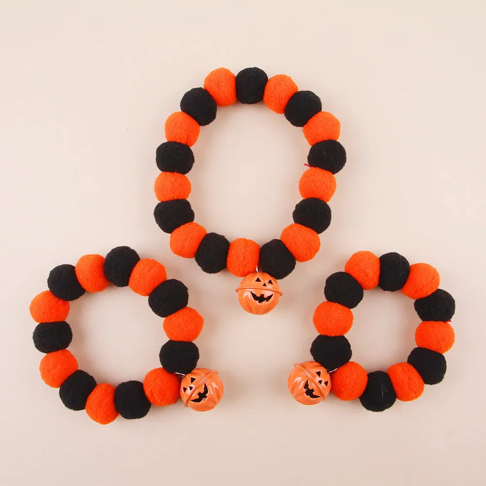 Halloween pet collar with pumpkin design and reflective elements for dogs and cats