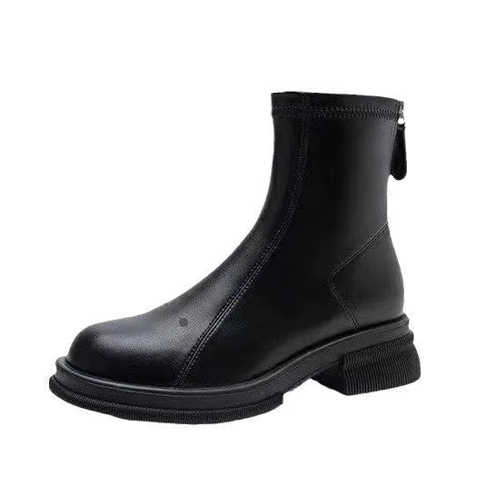 Women's black ankle boots with a flat thick heel, round toe, and a back zipper closure.
