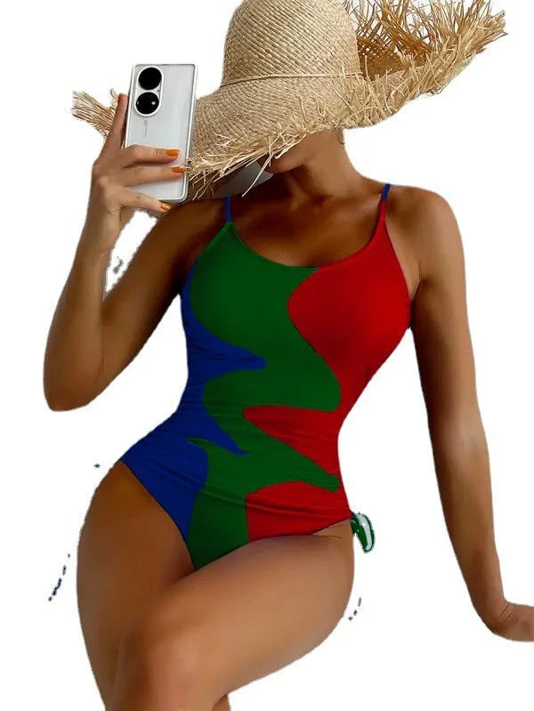 Women's blue sleeveless one-piece swimsuit with fixed trunks on a mannequin.