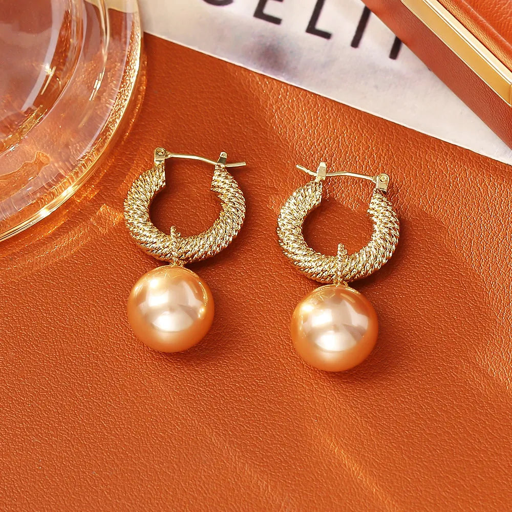 Geometric round copper earrings with real gold plating in white colour for women