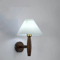 American retro style single head wall lamp with walnut wood frame and fabric shade, mounted on a wall.