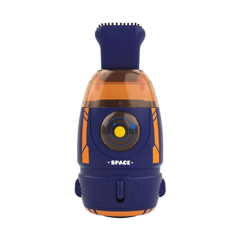 Handheld desktop vacuum cleaner in blue rocket design with USB charging cable on a wooden desk.