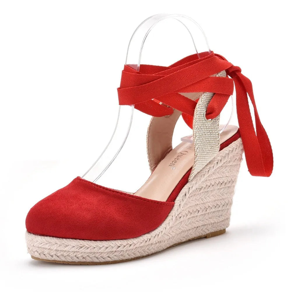 Women's apricot Bohemian wedge sandals with bead details, buckle strap, and a platform sole.