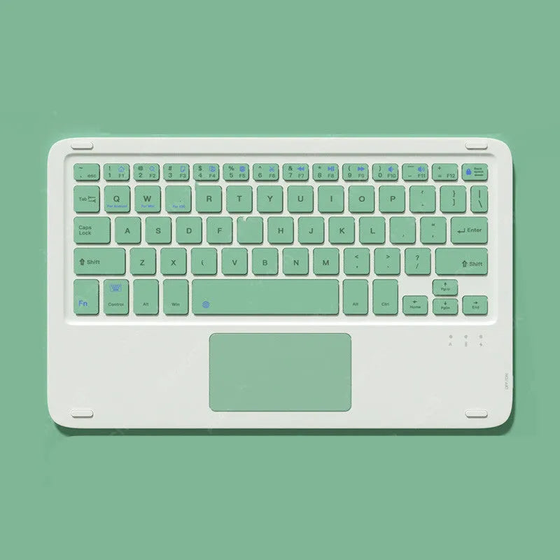 Pink Bluetooth touch keyboard and rechargeable wireless mouse on a desk next to a tablet.