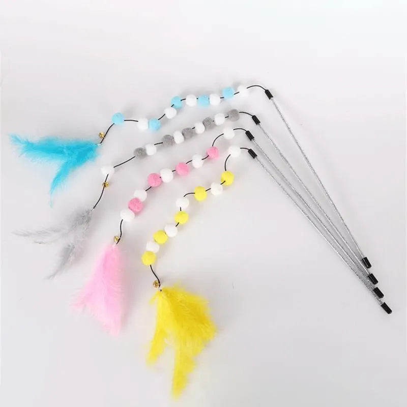 Blue cat teaser stick toy with a bell and a grey pompon feather, shown at approximate 31cm length.