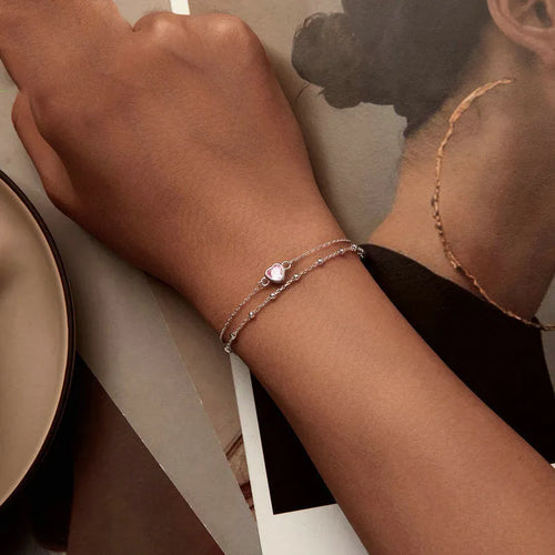 Sweet girlish style 925 sterling silver bracelet with a small heart-shaped pendant on an adjustable chain.