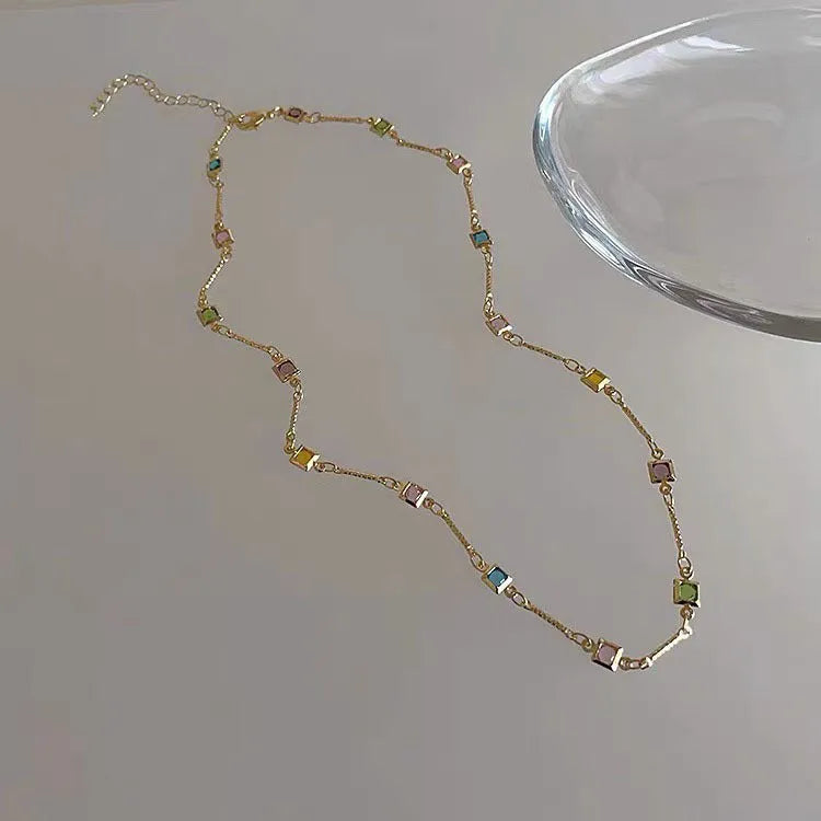 Square colour artificial crystal clavicle necklace with geometric design in gold finish