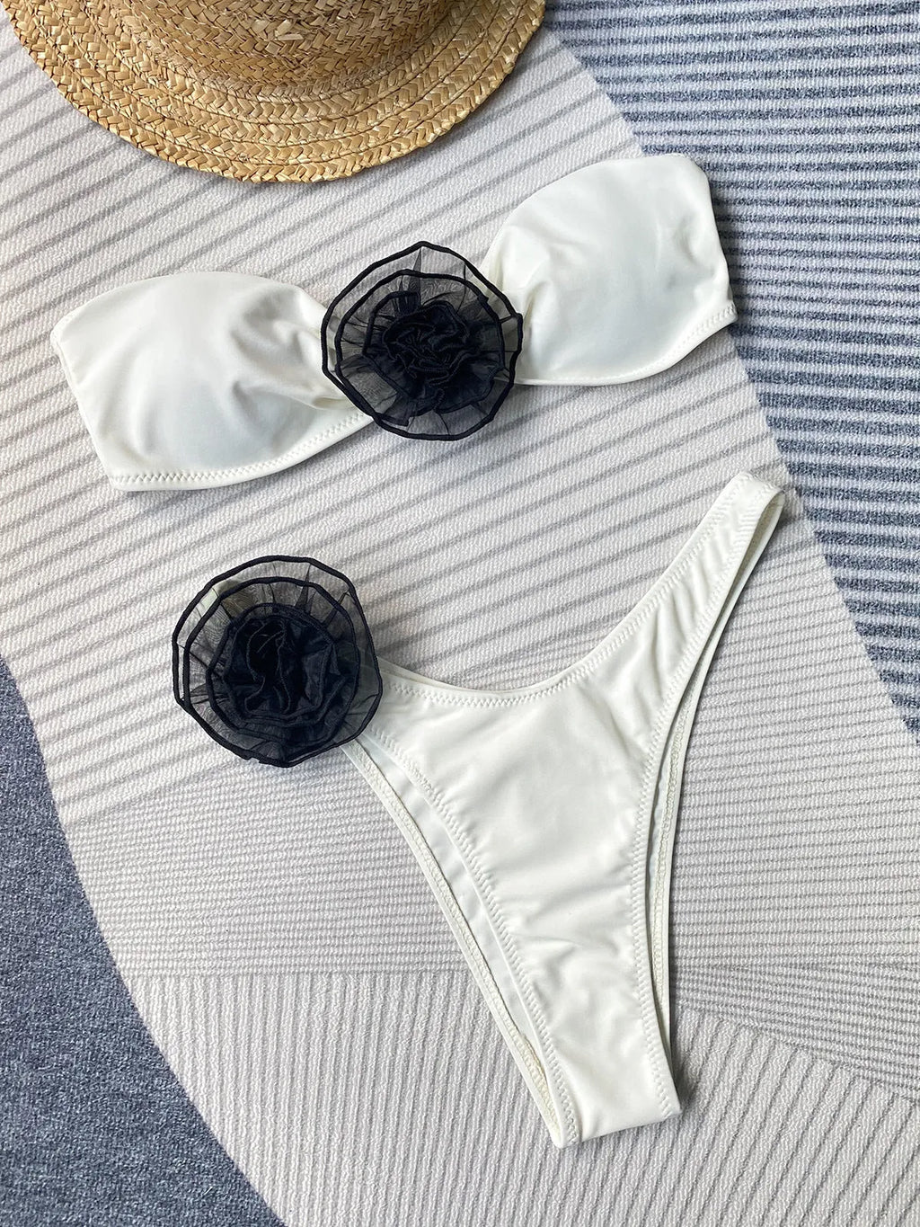 Women's cross-back bikini swimsuit with three-dimensional floral detailing in striped pattern