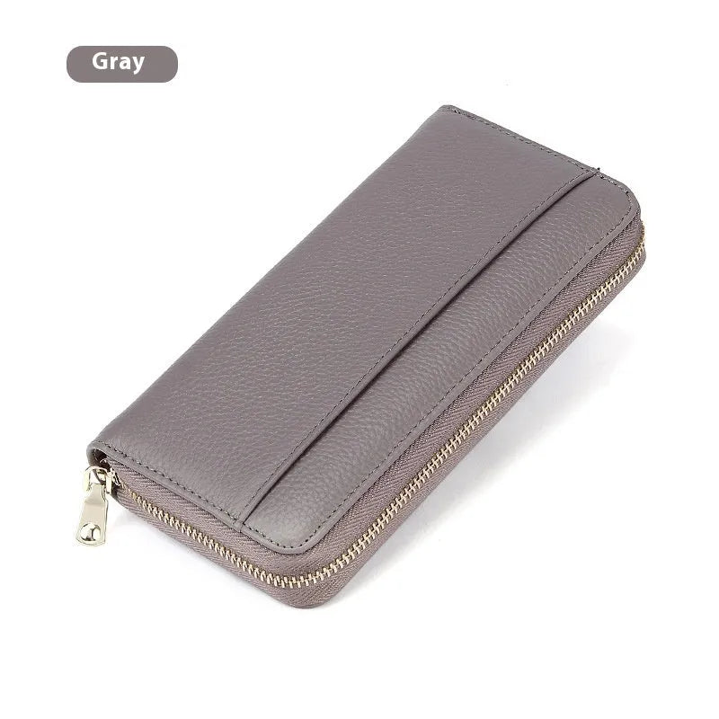 Genuine leather long wallet for women in multiple colours with large capacity and anti-theft card slots.