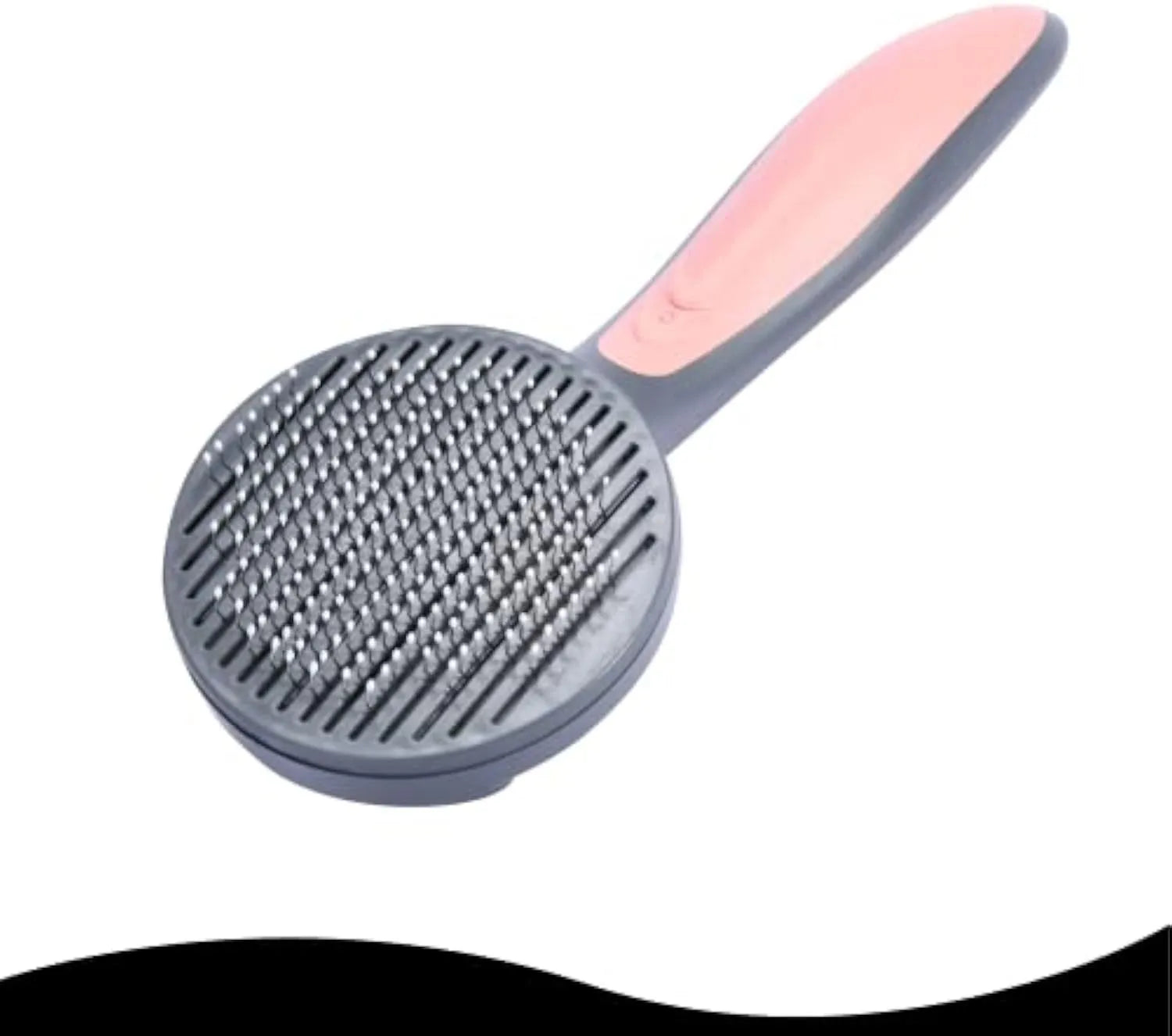 Grey self-cleaning slicker brush for grooming cats and dogs on a wooden table.