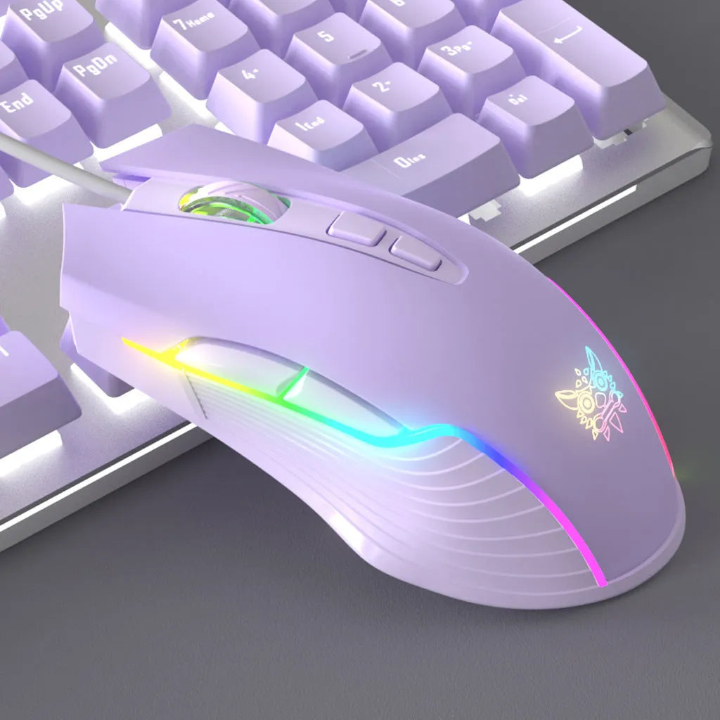 Purple and white mechanical keyboard, gaming mouse, and headset combo set with backlight on desk
