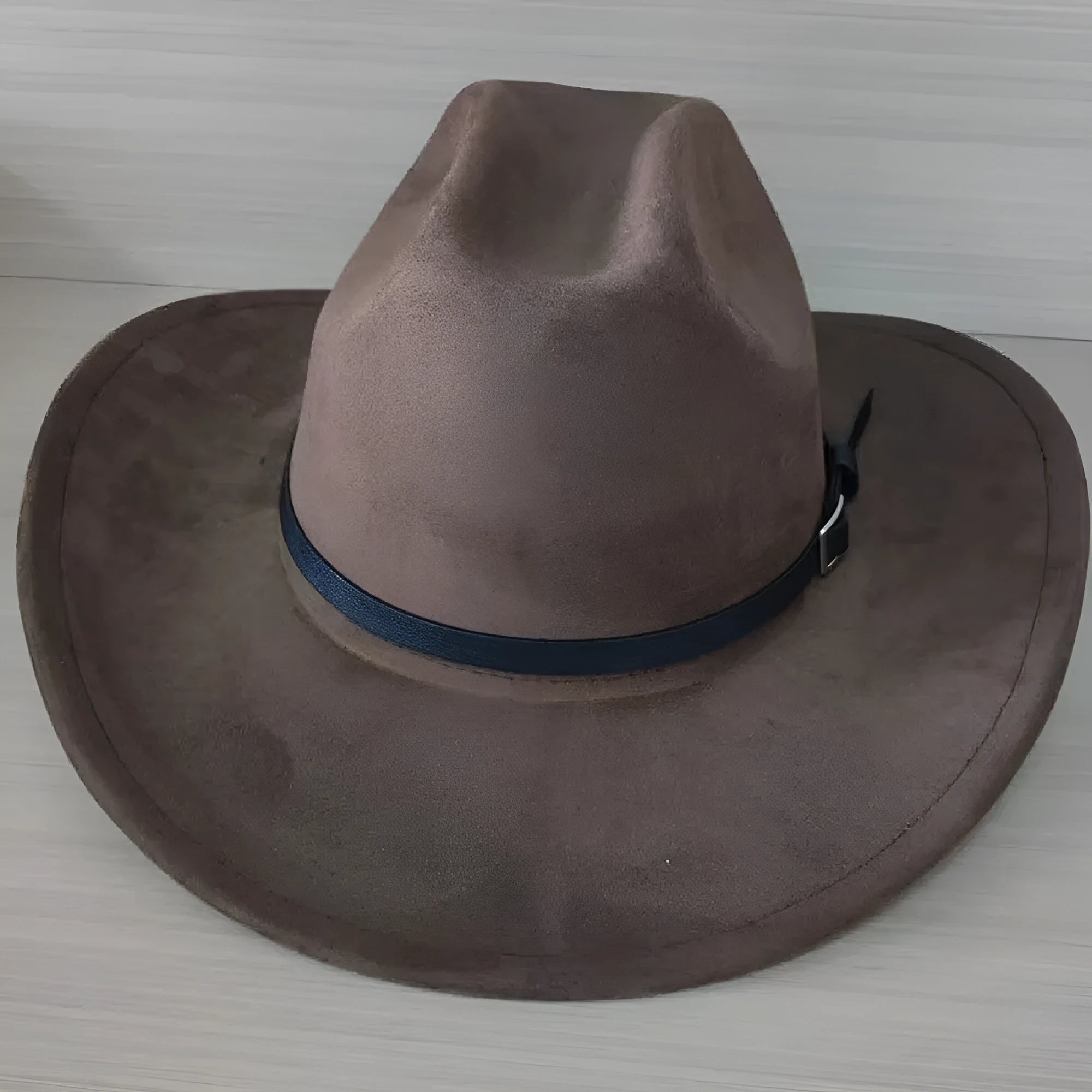 Brown leather velvet western cowboy hat with curved edge and conical crown style