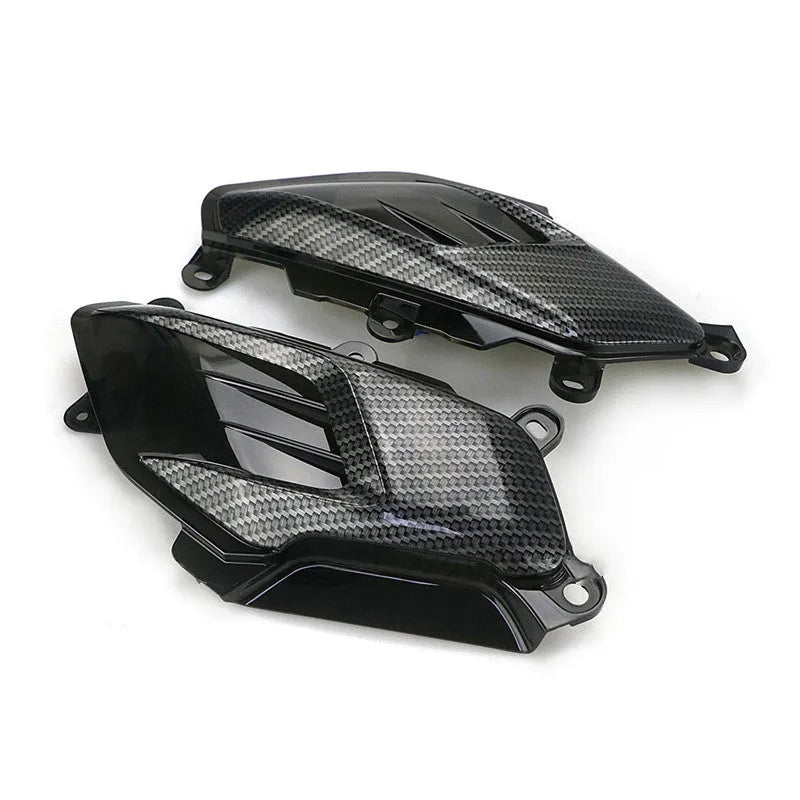 Pair of YAMAHA NMAX carbon fibre LED side lamps with blue or red light options.