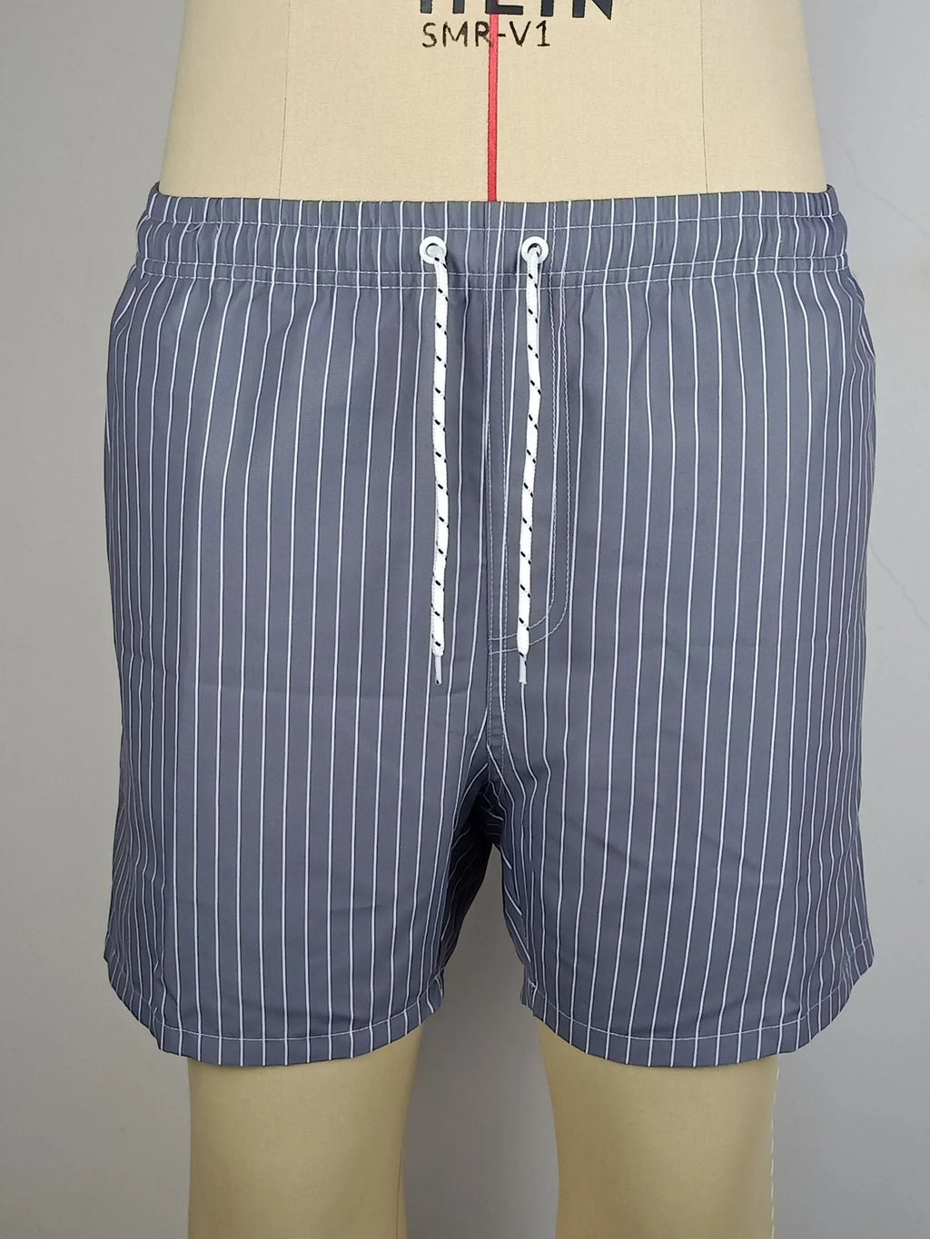 Men's striped polyester shorts with straight leg opening and triangle lining in four colour options