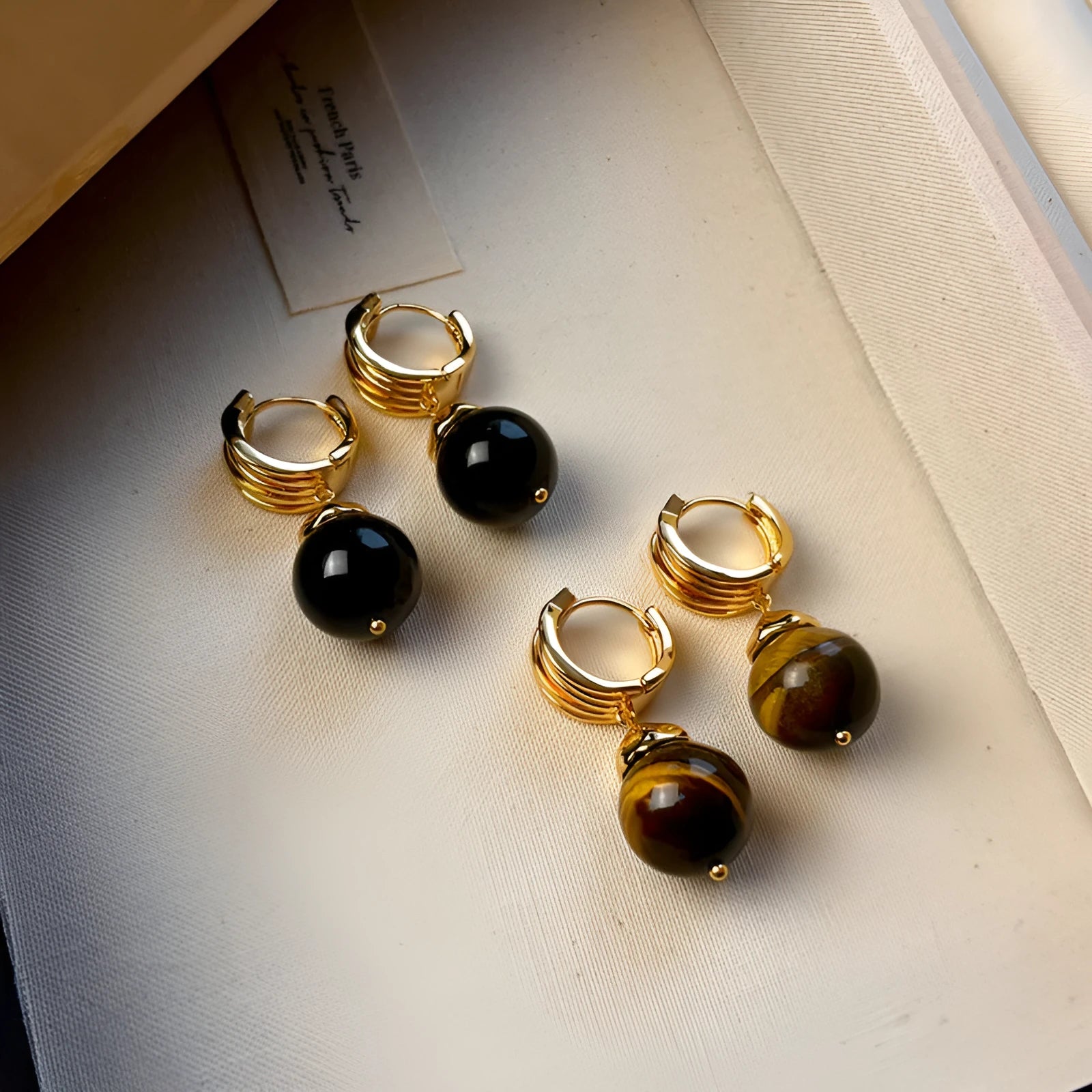 Gold plated tigereye geometric earrings for women in brown and black colours
