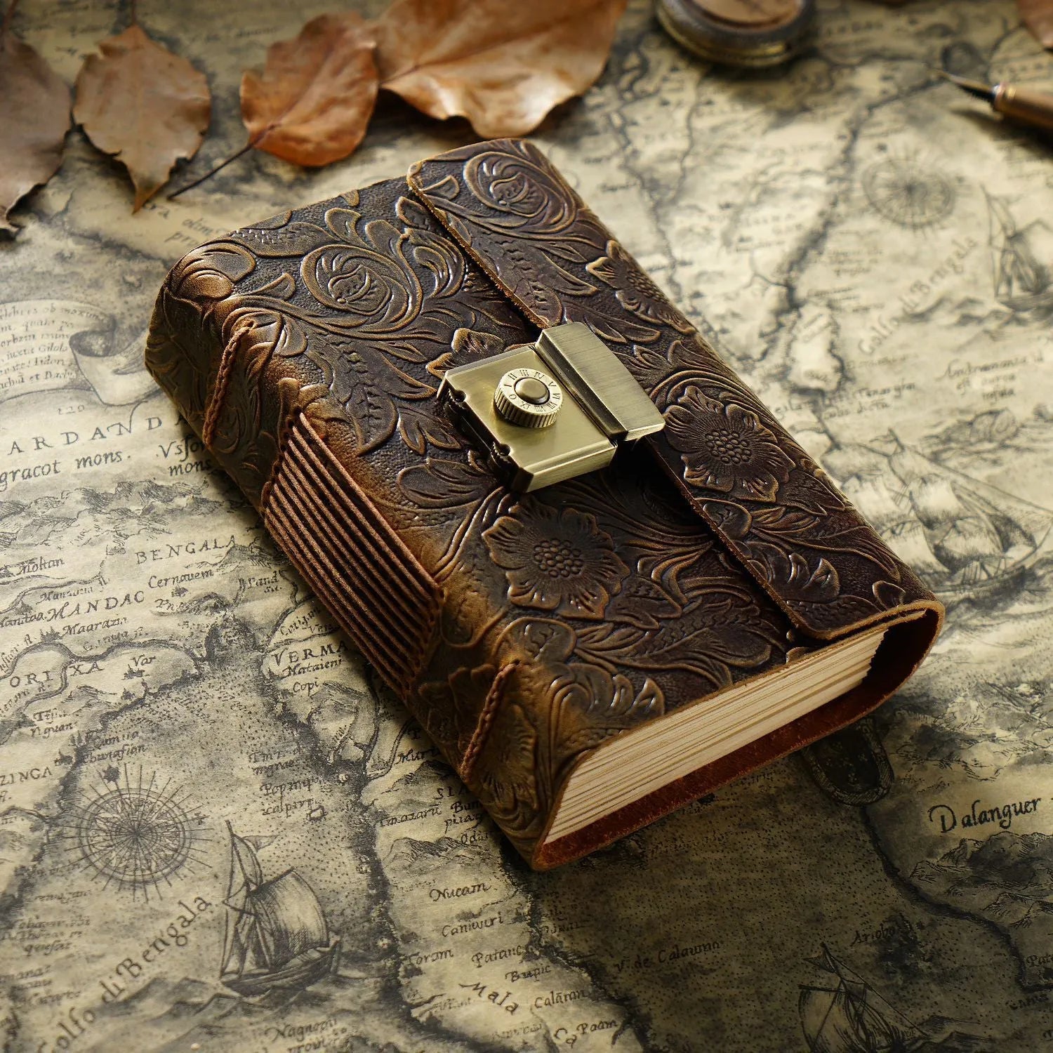 Vintage cowhide leather journal open on blank brown paper pages, A5 size, Crazy Horse brown colour with distressed finish