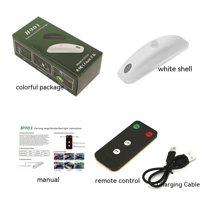 Black and white remote control car LED strobe light with charging cable on a grey background.