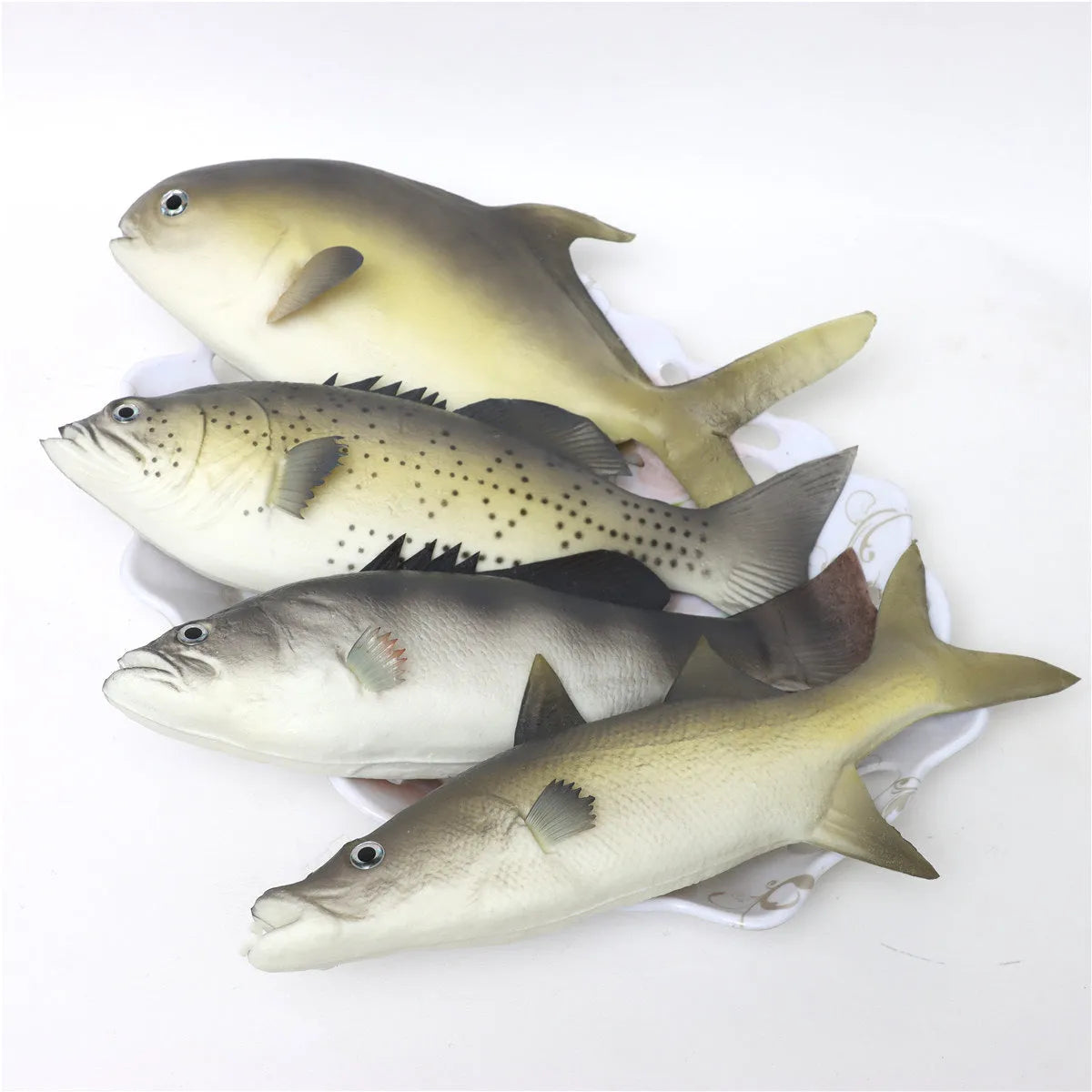 Three PU simulated fish ornaments showing yellow-fin tuna, small tuna and yellow croaker marine replicas