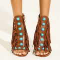 Women's round toe hollow tassel sandals with back zipper and super high heel in black and brown leather-look upper