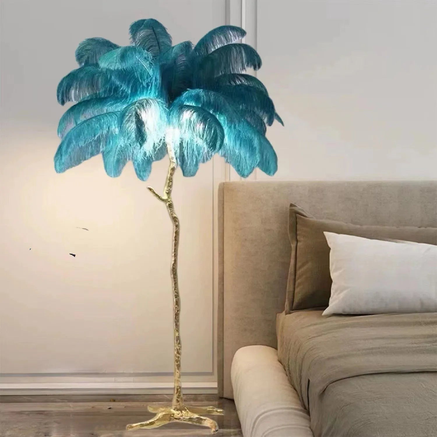 Tall resin feather floor lamp with a choice of white, pink or dark green feathers on a substantial base.