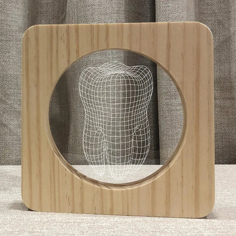 Wood colour plastic tooth shaped USB night lamp on a surface