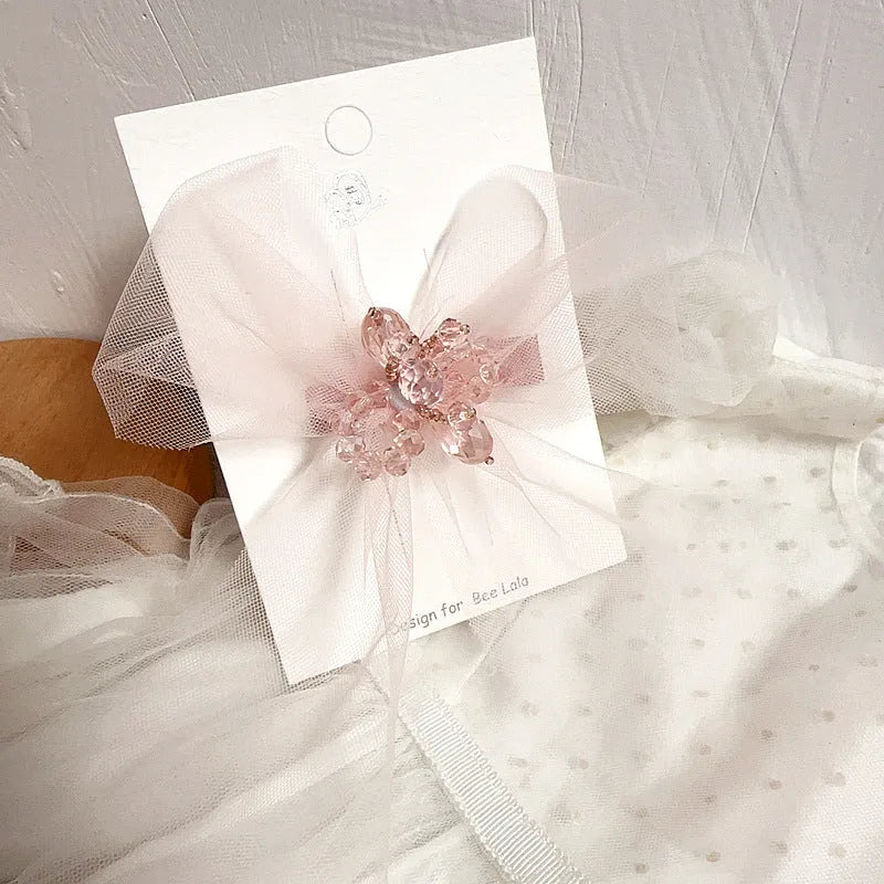 Children's press clip hair accessories set with cloth bows, sequins, pearls, and crystal flowers in pink and beige