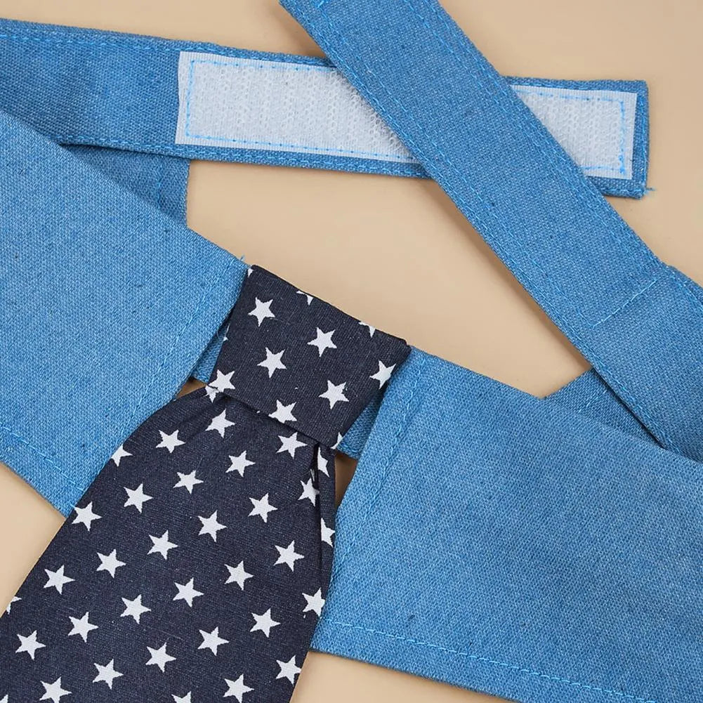 Blue denim dog collar with a star-pattern bow tie, shown with a fastener tape closure.