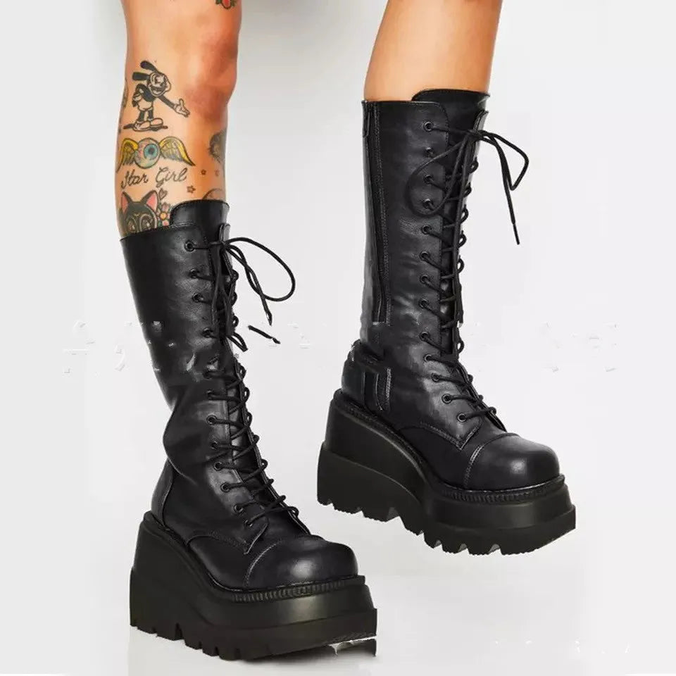 Women winter platform boots in black with front tie lace-up and genuine leather upper