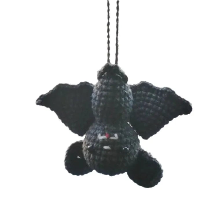 Plush hand-woven polyester automobile hanging ornament with cartoon style design on car dashboard