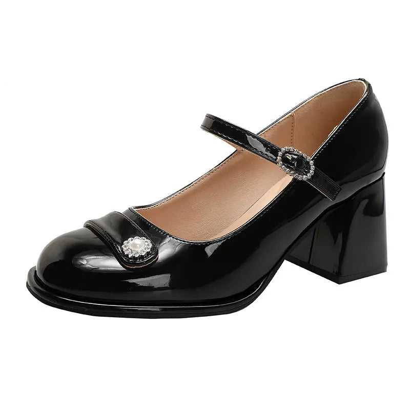 Women's black patent leather wide fit heels with chunky block heel and round toe design