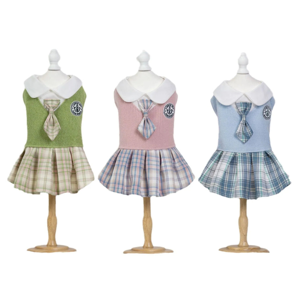 A pink, blue, or green tartan skirt for small dogs or cats in a princess costume style.